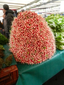 A mountain of fresh radishes at the Market